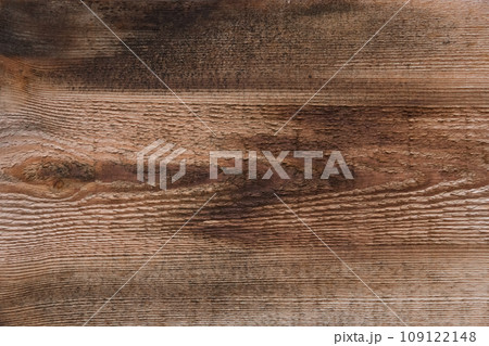 Old brown burnt wooden texture board pattern background plank abstract surface Old brown burnt wooden texture board pattern background plank abstract surface 109122148