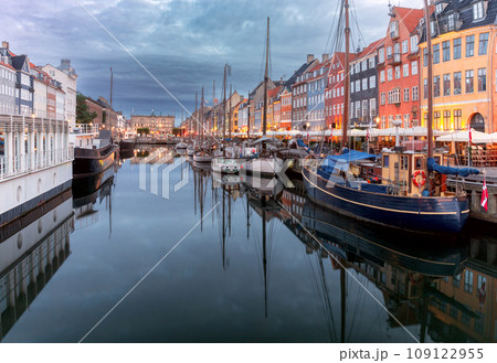 Copenhagen. Nyhavn canal colorful traditional houses and city embankment at sunrise. 109122955