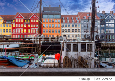 Copenhagen. Nyhavn canal colorful traditional houses and city embankment at sunrise. Copenhagen. Nyhavn canal colorful traditional houses and city embankment at sunrise. 109122972