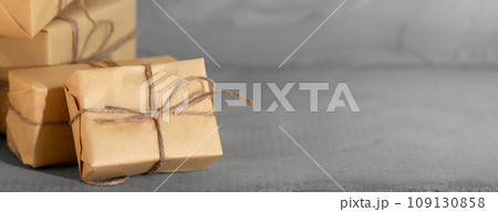 Christmas presents on dark textured background. Xmas greeting card with copy space. 109130858