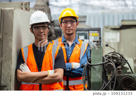 asian man engineer wear yellow helmet and uniform asian man engineer wear yellow helmet and uniform 109131235