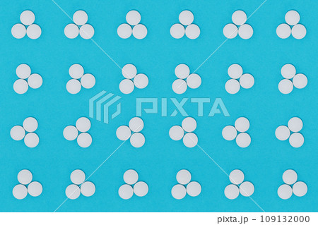 Dose of three white pills, seamless background, on blue. Dose of three white pills, seamless background, on blue. 109132000