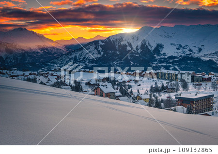Ski resort with deep snow at sunrise, La Toussuire, France Ski resort with deep snow at sunrise, La Toussuire, France 109132865