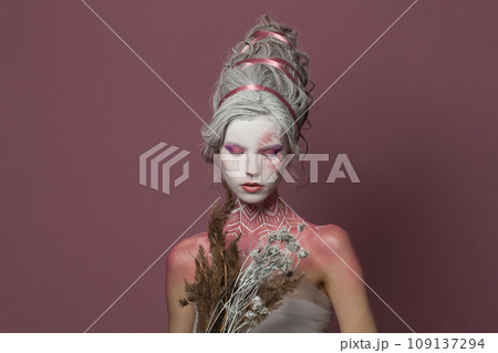 Pretty creative fashionable carnival model woman blonde, fashion beauty studio portrait Pretty creative fashionable carnival model woman blonde, fashion beauty studio portrait 109137294
