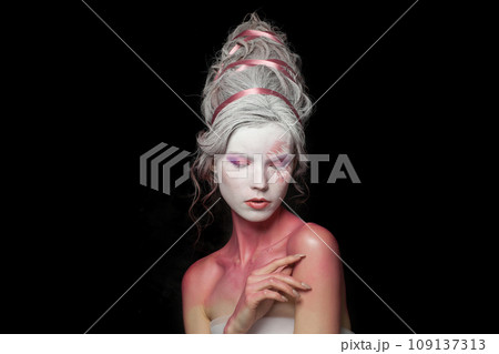 Gorgeous woman with makeup. Halloween and theatre concept. 109137313