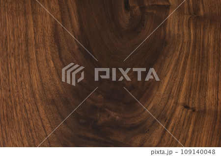 Black walnut wood texture with oil finish closeup 109140048