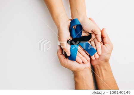 November, embrace Prostate Cancer Awareness with light Blue Ribbon featuring a mustache symbol of support for men's health. Ideal for healthcare, International Men's Day, World Cancer Day concepts. 109140145