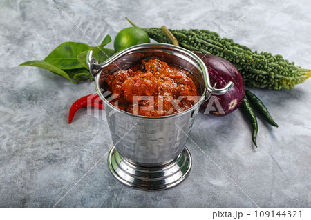 Indian cuisine - butter chicken with sauce Indian cuisine - butter chicken with sauce 109144321