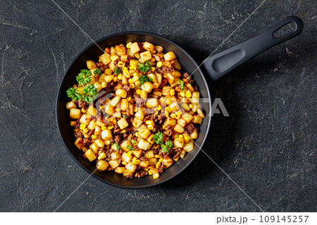 Beef Hash with roasted corn, garlic and parsley Beef Hash with roasted corn, garlic and parsley 109145257