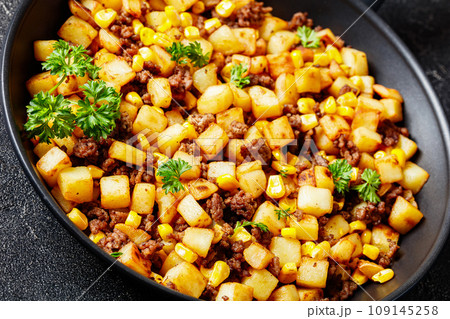 Beef Hash with roasted corn, garlic and parsley Beef Hash with roasted corn, garlic and parsley 109145258