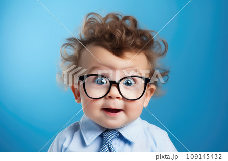 Funny child with glasses isolated on blue background. AI content 109145432