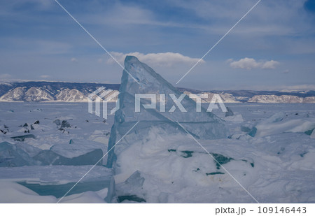 On the ice of Lake Baikal. beautiful pieces of ice. Ice hummock on the ice of lake Baikal On the ice of Lake Baikal. beautiful pieces of ice. Ice hummock on the ice of lake Baikal 109146443