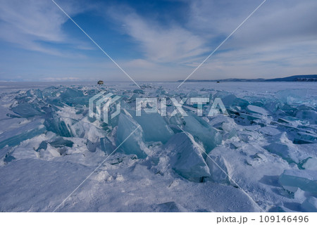 On the ice of Lake Baikal. beautiful pieces of ice. Ice hummock on the ice of lake Baikal On the ice of Lake Baikal. beautiful pieces of ice. Ice hummock on the ice of lake Baikal 109146496