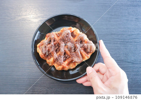 chocolate waffle or waffle with chocolate topping chocolate waffle or waffle with chocolate topping 109146876