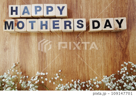 happy mothers day alphabet letters on wooden background happy mothers day alphabet letters on wooden background 109147701