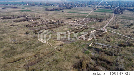 The ruins of a livestock farm, aerial view. Destroyed animal sheds. 109147987