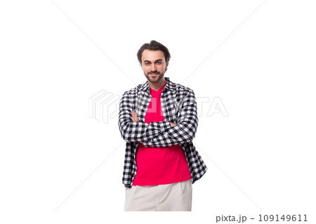 portrait of a young caucasian handsome guy with a beard and styled hair dressed in a plaid shirt 109149611