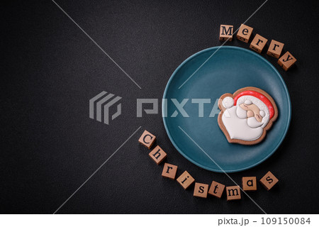 Beautiful Christmas composition with copy space with an inscription in wooden cubes Beautiful Christmas composition with copy space with an inscription in wooden cubes 109150084