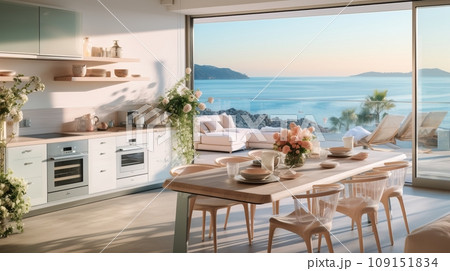 Cozy light kitchen interior with fancy modern furniture, dining area, spacious terrace and picturesque sea view. Luxury villa in a sea shore. Contemporary home design. 109151834