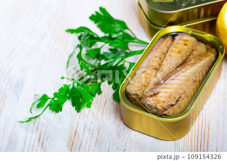 Mackerel fillets preserves in oil with herbs 109154326
