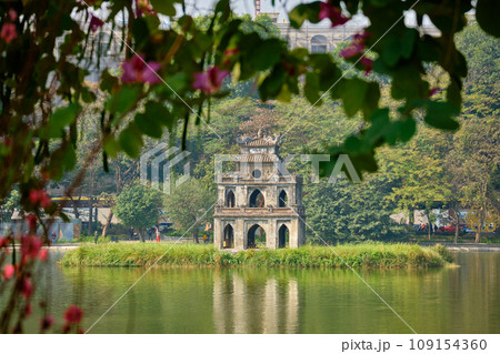 Turtle Tower Thap Rua on Hoan Kiem Lake in the daytime. Hanoi, VIETNAM. Turtle Tower Thap Rua on Hoan Kiem Lake in the daytime. Hanoi, VIETNAM. 109154360