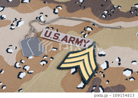 US ARMY sergeant rank patch and dog tags on Desert Battle Dress Uniform US ARMY sergeant rank patch and dog tags on Desert Battle Dress Uniform 109154813