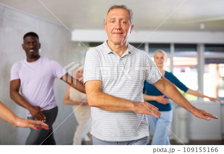 Group of multiethnic mature people dancing classical dance 109155166