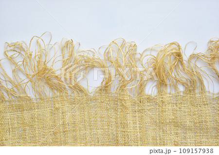 torn sackcloth isolated on white background, burlap fabric texture for design torn sackcloth isolated on white background, burlap fabric texture for design 109157938