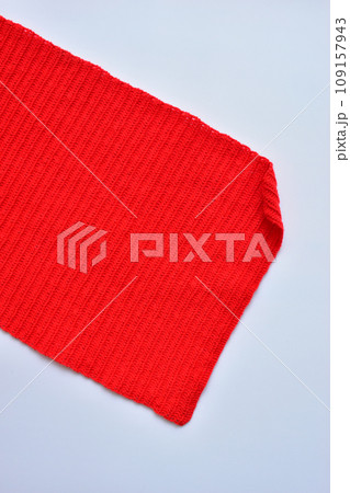 red wool knitted yarn texture, woolen fabric on white background red wool knitted yarn texture, woolen fabric on white background 109157943