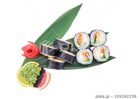 Portion of smoked eel rolls with cucumber on bamboo leaf 109162236