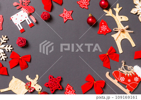 Christmas black background with holiday toys and decorations. Happy New Year concept with empty space for your design 109169161
