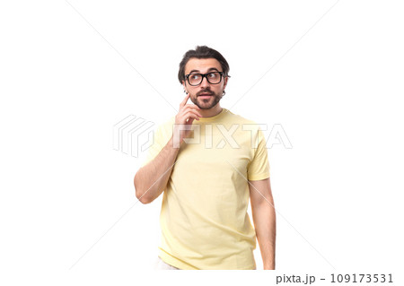 young stylish european man with stubble wears glasses for vision correction young stylish european man with stubble wears glasses for vision correction 109173531