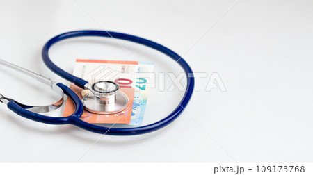 Stethoscope on euro paper money bank notes with copy space 109173768