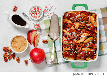 Baked Apple French Toast topped with pecan nuts Baked Apple French Toast topped with pecan nuts 109176351