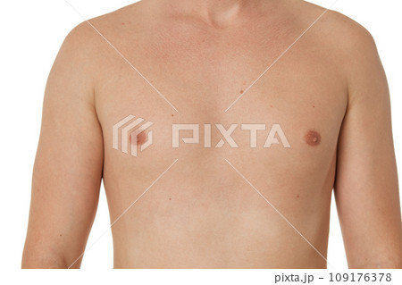 Muscular male torso and chest on white background, close-up Muscular male torso and chest on white background, close-up 109176378