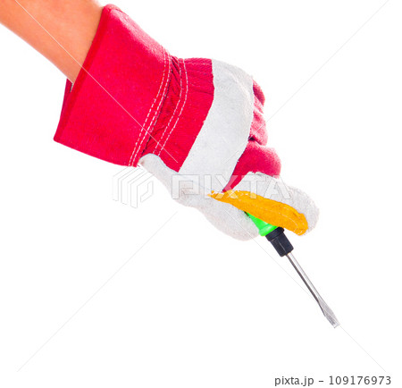 gloved hand with screwdriver 109176973