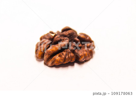 A picture of walnuts isolated on white background A picture of walnuts isolated on white background 109178063