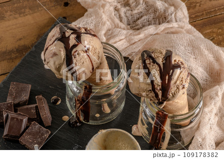 Chocolate ice cream in waffle cones 109178382