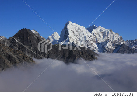 Autumn day above the clouds in the Himalayas, Nepal. Autumn day above the clouds in the Himalayas, Nepal. 109181932