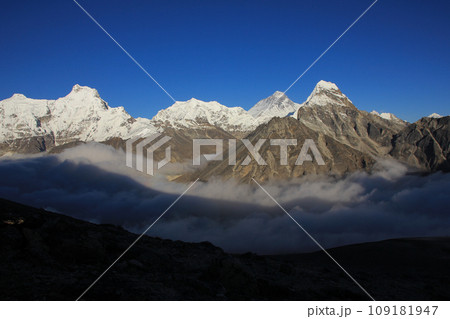 Mt Everest and other high mountains surrounded by a sea of fog, Nepal. Mt Everest and other high mountains surrounded by a sea of fog, Nepal. 109181947