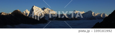 Bright lit peaks of Ama Dablam, Cholatse, Taboche and Tobuche. 109181992