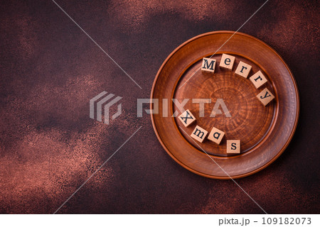 Beautiful delicious sweet winter Christmas gingerbread cookies on a bronze textured background 109182073
