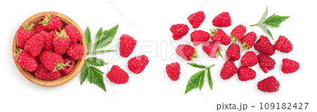raspberries in wooden bowl with leaves isolated on white background. Top view. Flat lay 109182427