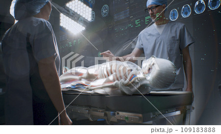 Surgeons in AR headsets. 3D graphics of human skeleton and organs Surgeons in AR headsets. 3D graphics of human skeleton and organs 109183888
