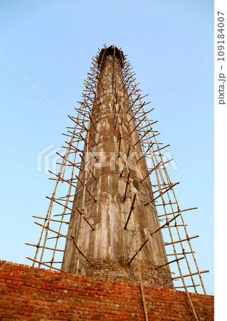 Newly constructed Chimney of a brickfield Newly constructed Chimney of a brickfield 109184007