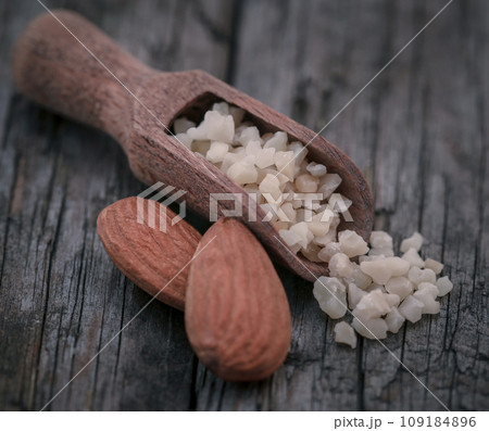 Small pieces of chopped almonds with whole ones Small pieces of chopped almonds with whole ones 109184896