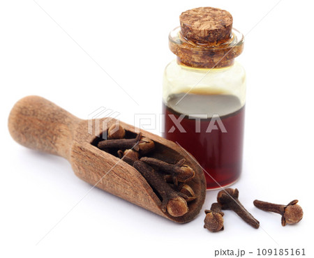 Fresh clove with oil in a jar Fresh clove with oil in a jar 109185161