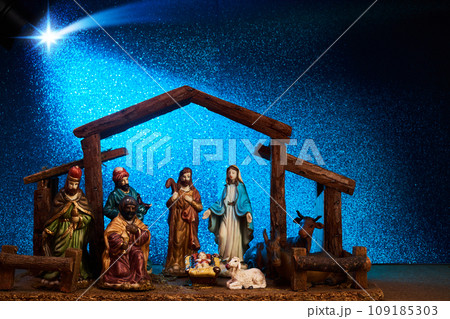 Christmas Manger scene with figurines including Jesus, Mary, Joseph Christmas Manger scene with figurines including Jesus, Mary, Joseph 109185303