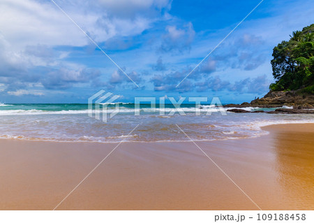 Beautiful sea beach background,Amazing sea ocean in good weather day,Beautiful waves crashing on sandy shore Nature beach sand background 109188458