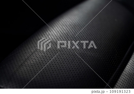 Close-up of black leather car seats. Close-up of black leather car seats. 109191323